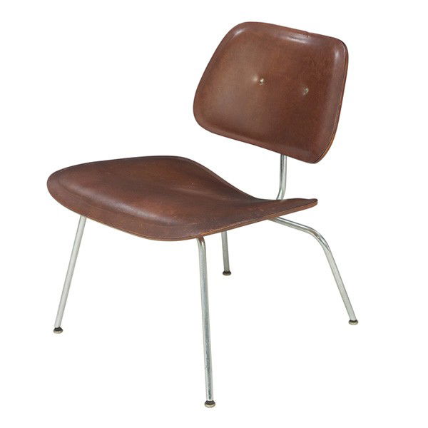 Charles & Ray Eames leather LCM, by Herman Miller: Charles & Ray Eames leather LCM, by Herman Miller, c.1950, original leather upholstery on a molded birch plywood frame, chromed steel legs with early glides, signed with foil label, original shock mou