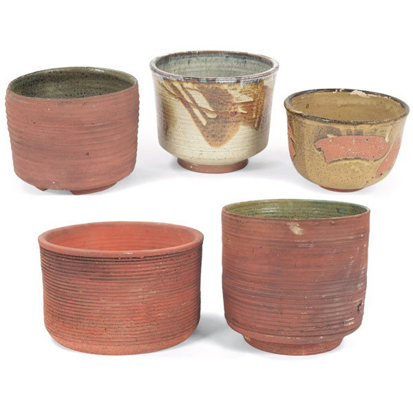 Edna Arnow planters: Edna Arnow planters, five, stoneware, three with incised horizontal ribs, two with glazes, largest: 11"dia., smallest 7.5"dia. x 5.25"h, four signed, very good condition