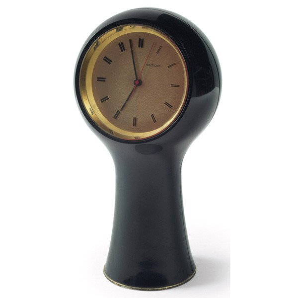 Angelo Mangiarotti table clock, by Secticon, model: Angelo Mangiarotti table clock, by Secticon, model t1, made in Switzerland, 1960s, black molded plastic case with gilt dial, signed on dial, 9.5"h, very good condition