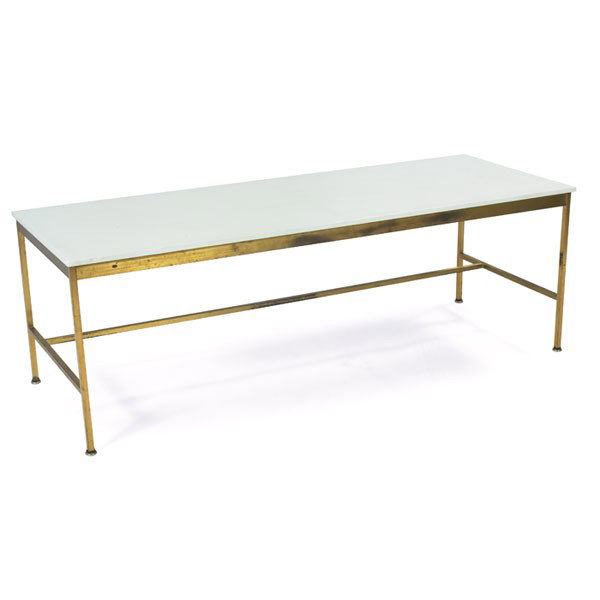 Paul McCobb coffee table, by Directional: Paul McCobb coffee table, by Directional, brass frame supports the original white glass top, all feet intact, 48"w x 18"d x 16.5"h, some tarnish, otherwise excellent original condition