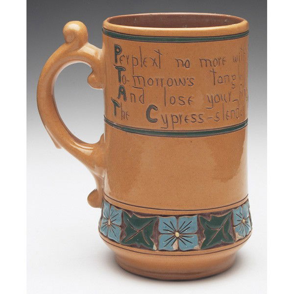 Rozane Della Robbia handled vessel, tan glaze with: Rozane Della Robbia handled vessel, tan glaze with carved and painted floral design and poem, artist initial M, 5.5"w x 6"h