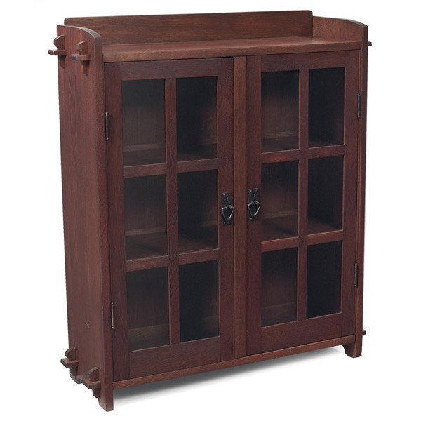 Gustav Stickley bookcase, #523: Gustav Stickley bookcase, #523, low form with two doors with original hardware supported by slab sides with key and tenon construction, refinished, signed with red decal, 40"w x 12.5"d x 45"h, very go
