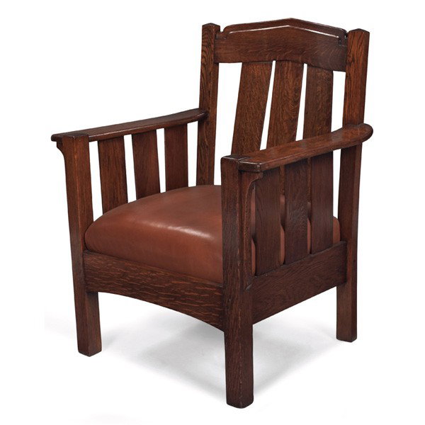 Stickley Brothers armchair, attribution: Stickley Brothers armchair, attribution, unusual form with a carved and peaked rail over three vertical slats, recovered leather cushion above an arched seat rail, unsigned, refinished, 31"w x 25"d x 