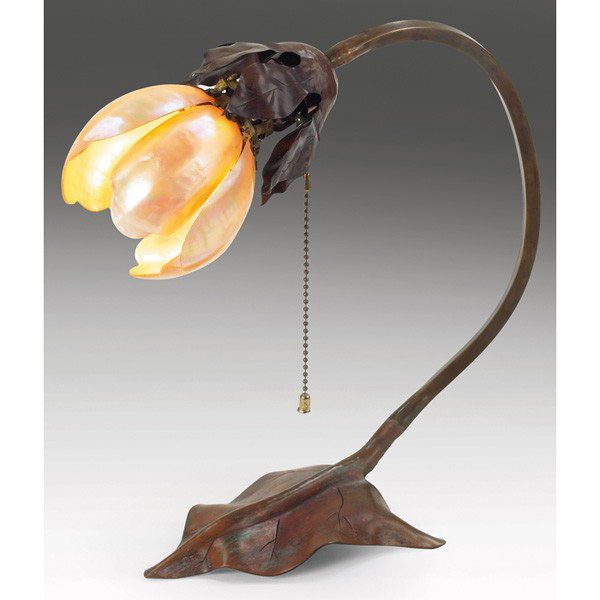 Arts and Crafts lamp, in the style of Elizabeth Ea: Arts and Crafts lamp, in the style of Elizabeth Eaton Burton, abalone shell shade supported by an incised copper base with leaf design, 12"w x 5"d x 12.5"h, very good condition