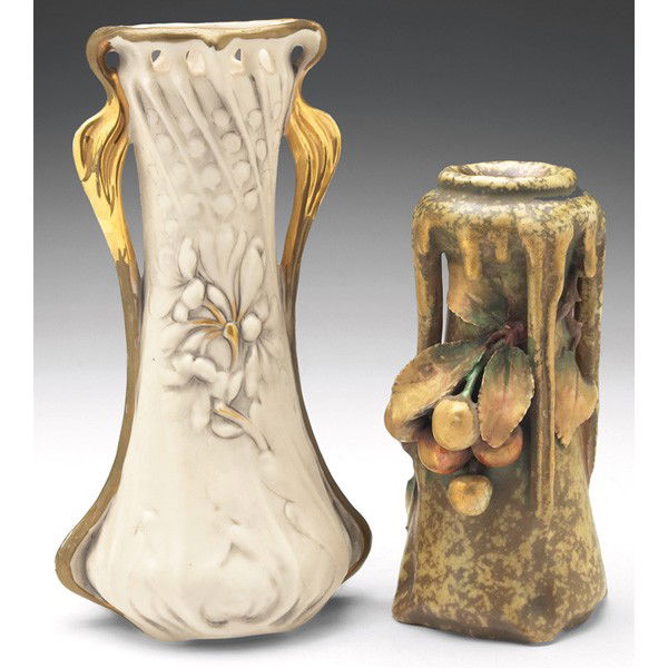 Royal Dux; Amphora: Royal Dux vase, double handled shape, in an ivory glaze with a raised organic design, gold accents, #5206, 5"w x 9"h, hairline to base; with an Amphora Edda vase, unusual form with a sculpted and appl