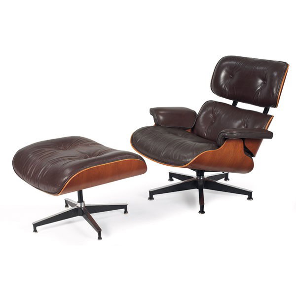 Charles and Ray Eames 670/671 lounge chair and ott: Charles and Ray Eames 670/671 lounge chair and ottoman, by Herman Miller, molded cherry plywood shell with brown leather cushions over a black enameled and polished aluminum base, original finish, cha