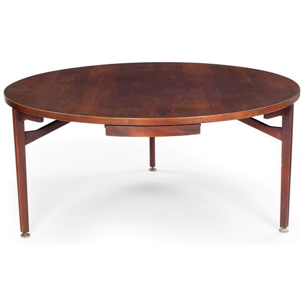 Jens Risom table/desk, by Jens Risom, Inc.: Jens Risom table/desk, by Jens Risom, Inc., round walnut top over three legs, angled supports, metal disk feet, one drawer, grooved legs with metal trim (some trim missing), 63"dia. X 28.5"h, stains t