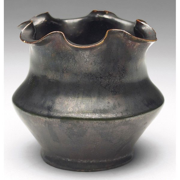 George Ohr vase, charcoal glaze: George Ohr vase, waisted shape with a pinched rim covered in a charcoal glaze, signed, 3.5"w x 3"h, minor chips
