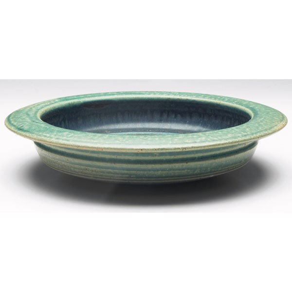 Val Cushing bowl, 10w: Val Cushing bowl, broad hand-thrown shape covered in a green and blue matte glaze, signed, 10"w x 2"h