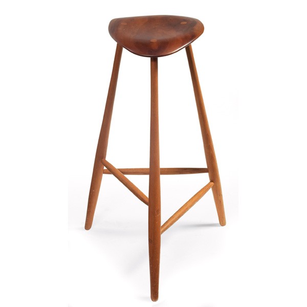 Wharton Esherick stool: Wharton Esherick stool, 1966, sculptural free-form walnut seat over tapered legs of carved oak, original finish, 16.5"w x 13"d x 25.5"h, carved signature "W.E. 1966", excellent original condition