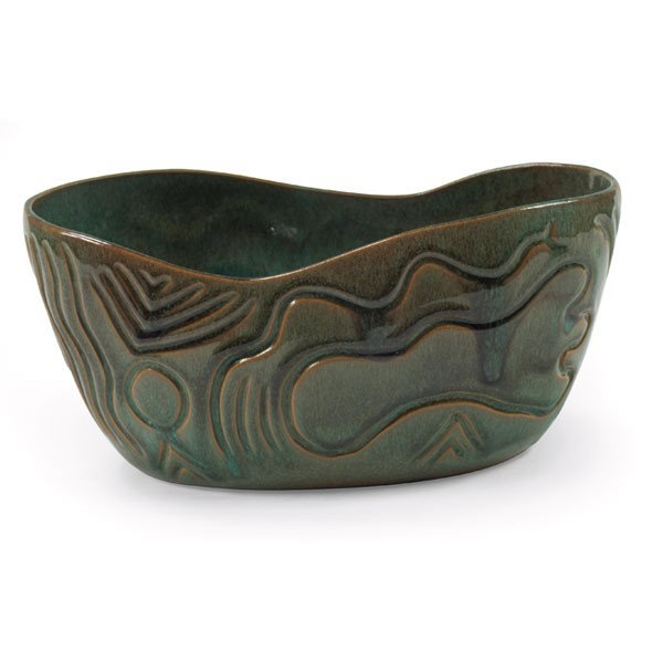 Julio de Diego bowl: Julio de Diego bowl, for Stonelain, oblong form with carved decoration and intentionally uneven rim, with impressed "Stonelain" and artist's mark, 11.5"w x 6"d x 5.5"h, mint condition