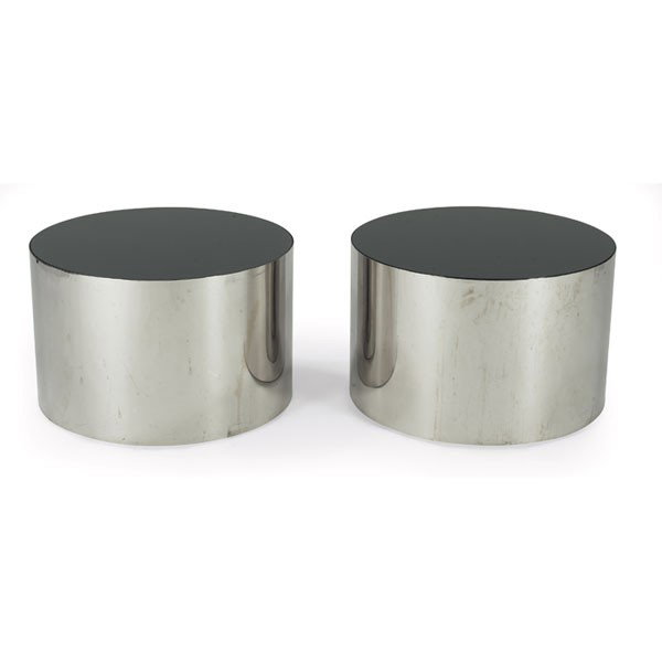 Directional tables, pair, attribution: Directional tables, pair, attribution, polished steel cylinders with inset black glass tops, 24"dia x 15.5"h, very good condition