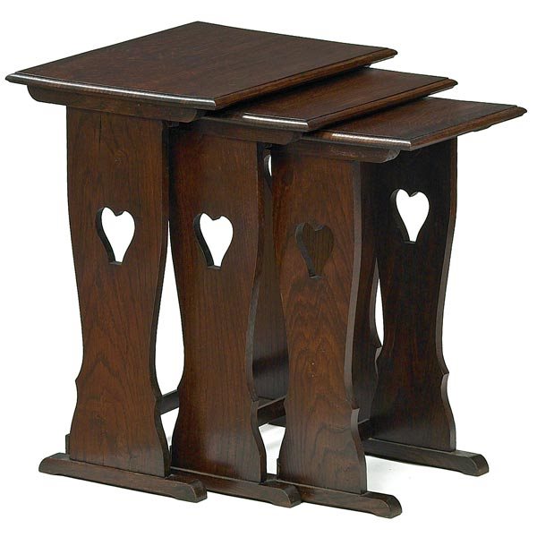 Arts & Crafts style nesting tables, set of three: Arts & Crafts style nesting tables, set of three, contemporary, slab sides with heart cut-outs on a shoe-foot base, refinished, unsigned, 18"w x 14"d x 22"h, very good condition