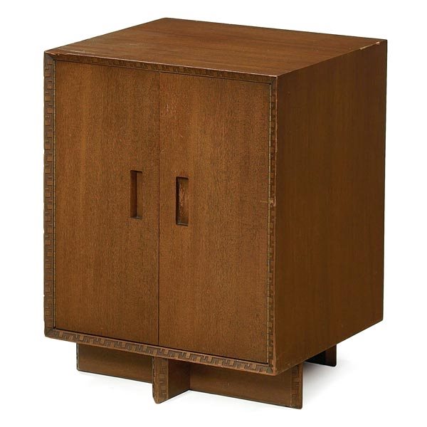 Frank Lloyd Wright cabinet: Frank Lloyd Wright cabinet, manufactured by Heritage Henredon, two doors with vertical recessed handles and Taliesin design at borders, some damage to edges and wear to original finish, 21 1/2"w x 20"