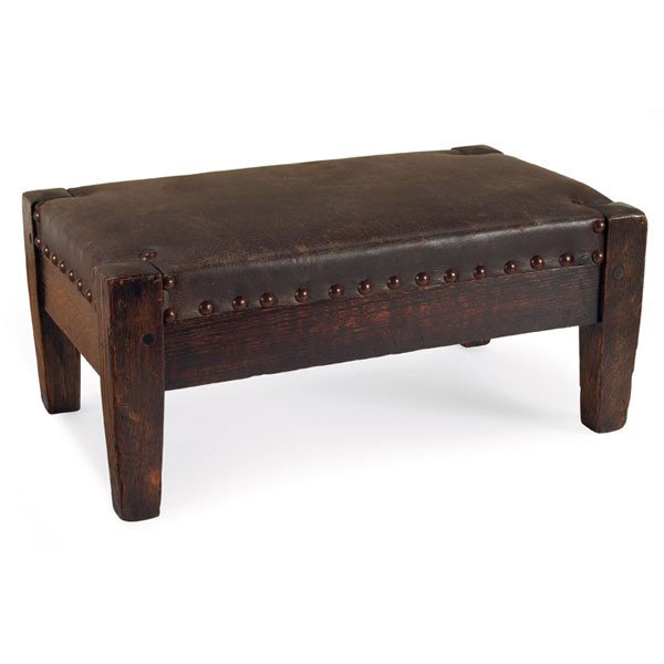 Arts & Crafts footstool, in the style of Roycroft: Arts & Crafts footstool, in the style of Roycroft, leather top on tapered legs, worn finish, replaced leather, 18"w x 11"d x 8"h, good condition