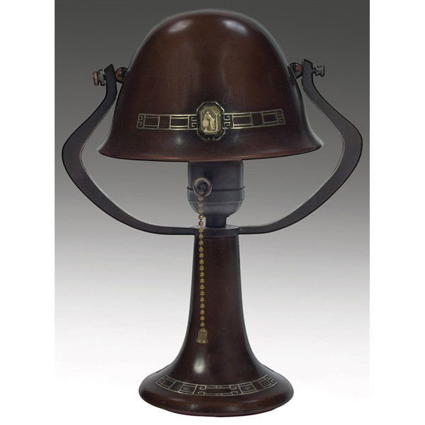 Heintz lamp, helmet shade with silver: Heintz lamp, helmet shade with silver overlay design on bronze and an unusual cameo inset on shade, 8"w x 10"h