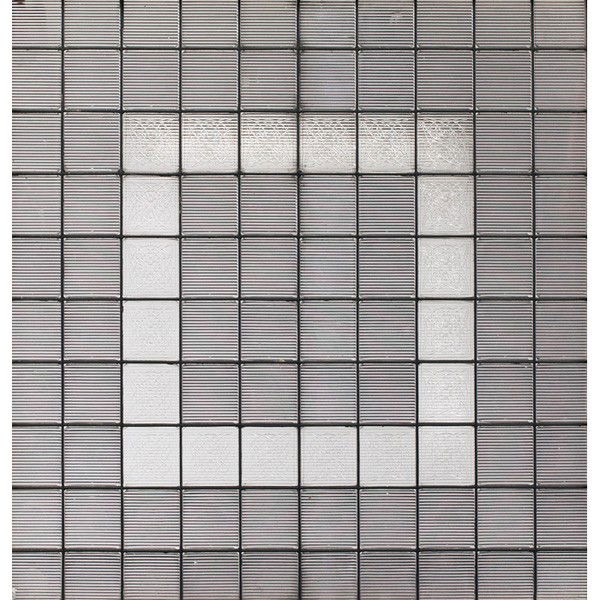 Luxfer prism window, 100 prisms: Luxfer prism window, 100 prisms held together with leaded glass, twenty Frank Lloyd Wright designed-prisms make up the central border, glass: 40"w x 39"h, very good condition