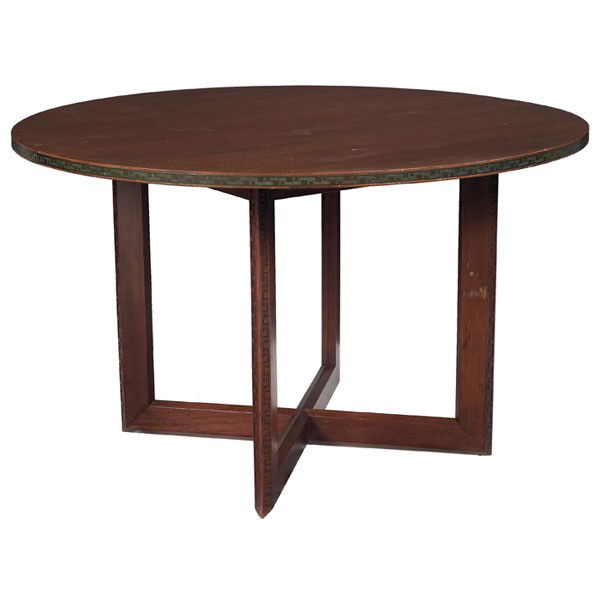 Frank Lloyd Wright table: Frank Lloyd Wright table, manufactured by Heritage Henredon, circular top with incised copper band over a cruciform base with Taliesin design at edges, three original 16" leaves with copper band and a