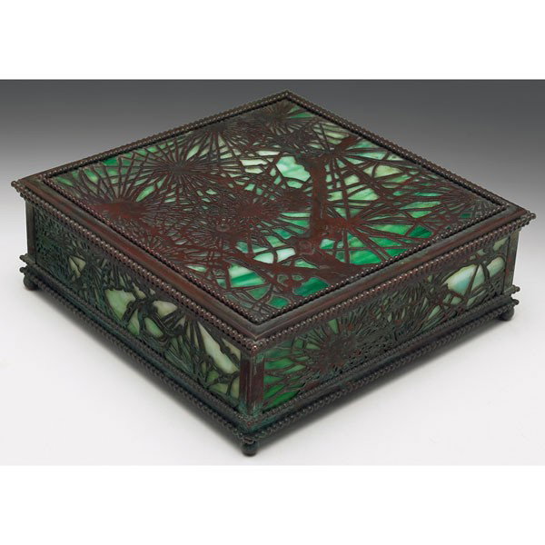 Tiffany Studios box, bronze in the pine: Tiffany Studios box, bronze in the pine needle pattern, green and white glass, original patina, unmarked, 8"sq x 2.75"h, crack to bottom glass panel, repaired damage to beading on lid