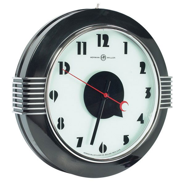 Herman Miller wall clock, Art Deco: Large Herman Miller wall clock, Art Deco form with stylized numerals and hands, black enameled case with chrome trim, refinished, signed on face "Herman Miller Clock Co. Zeeland, Mich. USA", 21" diame