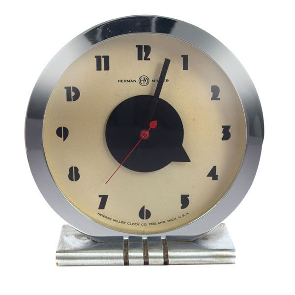 Gilbert Rohde Art Deco table clock: Gilbert Rohde Art Deco table clock, by Herman Miller, 1930s, round chromed metal case, stainless base, stylized numerals, signed on face, original hands, original cord, 6"w x 2.5"d x 6.5"h, excellent