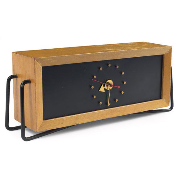 Jefferson Electric Co. Contemporaire" table clock: Jefferson Electric Co. "Contemporaire" table clock, Zeeland MI, 1950s, limed oak case with black enameled metal legs, black face with brass hour markers, original red second hand, signed with Jefferso