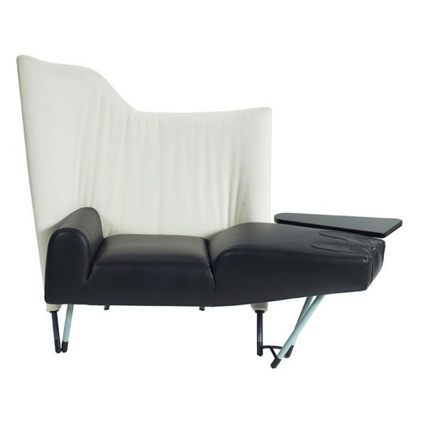 Paolo Deganello "Torso" chaise: Paolo Deganello "Torso" chaise, by Cassina, original black leather seat cushion, white canvas backrest, light blue and gray legs, black caps to feet, attached table with original black finish, signed
