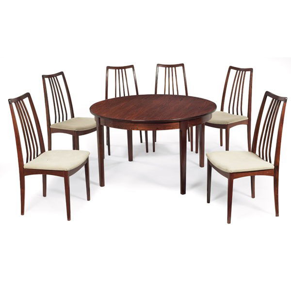 Koefoeds rosewood dining table and chairs: Koefoeds rosewood dining table and chairs, Denmark, round table with one leaf, chairs with vertical slat backs, unsigned, original finish, table: 48"dia x 28.5"h, chairs: 19.5"w x 22"d x 38.5"h, excel