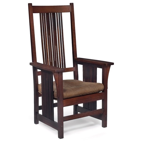 Gustav Stickley armchair, #386: Gustav Stickley armchair, #386, dramatic high-back form with spindles at back and sides and corbel supports under each arm, original sling seat holds a recovered leather cushion, original finish, sign