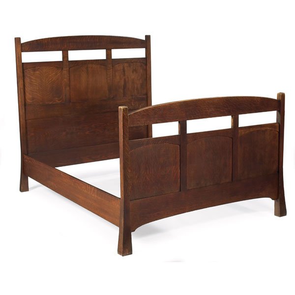 Arts and Crafts bed: Arts and Crafts bed, double-size with arched and paneled head and footboards, reverse-tapered legs, original finish, 58.5"w x 78"l x 56"h, very good condition