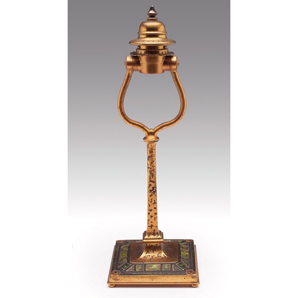 Tiffany Furnaces lamp base: Tiffany Furnaces lamp base, bronze with an original gold dore patina, enameled geometric designs, signed Louis C. Tiffany Furnaces, Inc., #369, 5"w x 14.5"h