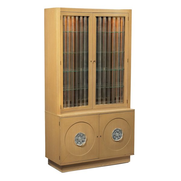 Lorin Jackson china cabinet, for Grosfeld House, m: Lorin Jackson china cabinet, for Grosfeld House, USA, 1940s, curved front, bleached mahogany, lighted upper cabinet with two doors with vertical acrylic rods, four glass shelves, mirrored back wall, t