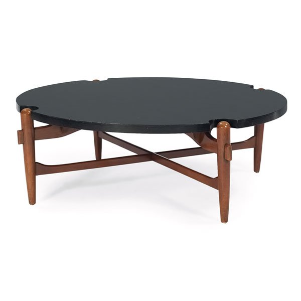 1950s coffee table, designer unknown: 1950s coffee table, designer unknown, round black laminate top with notches to allow for the four leg posts, sculptural wood frame with cross-stretchers, original finish, unsigned, 40"dia X 13.75"h, v