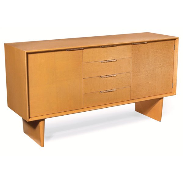 Gilbert Rohde sideboard, 1939, by Herman Miller, m: Gilbert Rohde sideboard, 1939, by Herman Miller, model 3979, form the All Walnut Group, four drawers and two doors all with the original Plexiglas handles, plinth bases, subtle checkerboard veneer pat