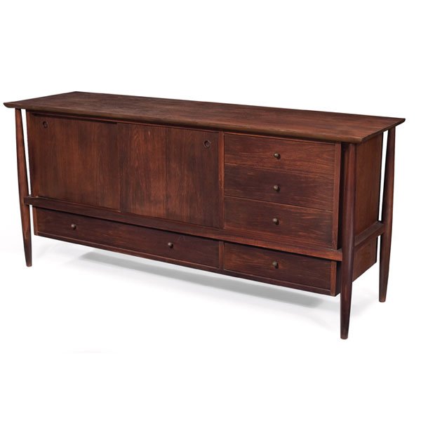 Finn Juhl sideboard, for John Stuart, walnut: Finn Juhl sideboard, for John Stuart, walnut, cabinet is suspended in a wood frame and supported by four legs, two sliding doors, six drawers, original round pulls, refinished, signed with stenciled m
