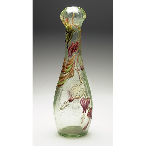 Galle vase, textured clear glass, bleeding heart d: Early and fine Galle vase, unusual shape with a corolla top in textured clear glass having a subtle green tint, fire polished surface with some patination, nicely detailed enameled bleeding heart desi