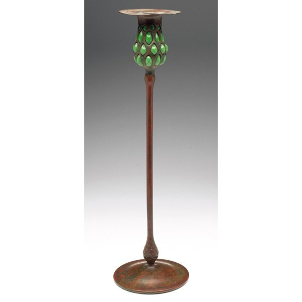 Tiffany Studios candlestick, bronze, blown-out gre: Nice Tiffany Studios candlestick, large slender shape in bronze with blown-out green glass at top and corresponding detail at bottom, excellent original patina, glass is original and has a good deep c
