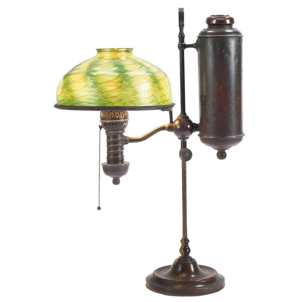 Tiffany Studios student lamp, bronze base, damasce: Tiffany Studios student lamp, bronze base with its original patina, holding a 10"favrile glass shade with a gold and green damascene pattern, shade signed L.C.T., base signed Tiffany Studios, New York