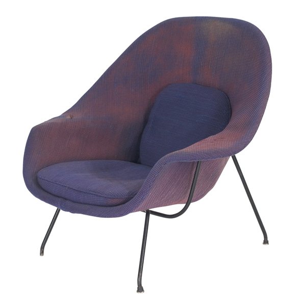 Eero Saarinen Womb chair, Knoll, early: Eero Saarinen Womb chair, by Knoll, early black rod frame, original worn and faded upholstery, 40"w x 34"d x 36"h, one foot missing, good original condition. The Collection of Mort and Millie Goldshol