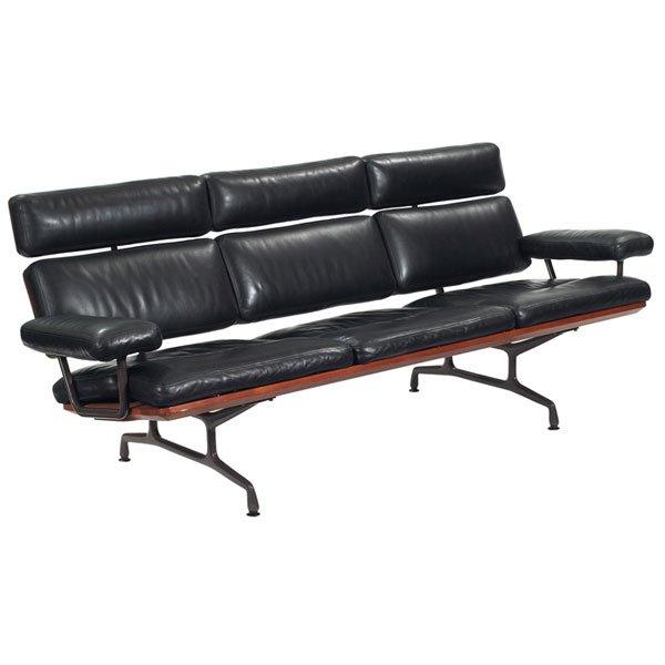 Charles and Ray Eames Soft-Pad three-seat sofa: Charles and Ray Eames Soft Pad three-seat sofa, by Herman Miller, c. 1984, two floating teak backrest panels, original black leather upholstery, aluminum frame, all glides intact, original finish, 80.