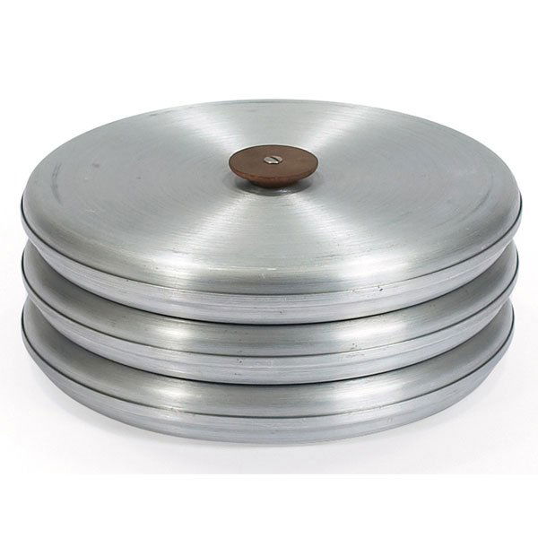 Russel Wright aluminum snack trays, 3: Russel Wright spun aluminum stacking snack trays, three, each with the original wood handle, each stamped "RUSSEL WRIGHT", as shown: 10.75"dia x 4.5"h, very good original condition