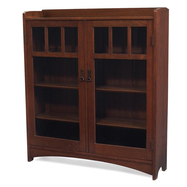 L & JG Stickley bookcase: L & JG Stickley bookcase, similar to #654, two doors with divided panes and original copper pulls above arched rails, signed with Handcraft decal, recoated original finish, 48"w x 12"d x 54"h, very go