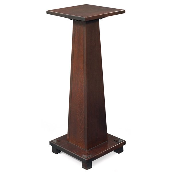 Stickley Brothers pedestal: Stickley Brothers pedestal, #133, square top above a column base with peaked thru-post feet, signed with Quaint metal tag, original finish, 13"w x 13"d x 34"h, very good condition