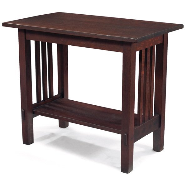 Stickley Brothers table: Stickley Brothers table, altered version of #2882, rectangular top above spindled sides and a lower shelf, refinished, cut-down, restoration to one foot, unsigned, 30"w x 18"d x 25.5"h, good condition