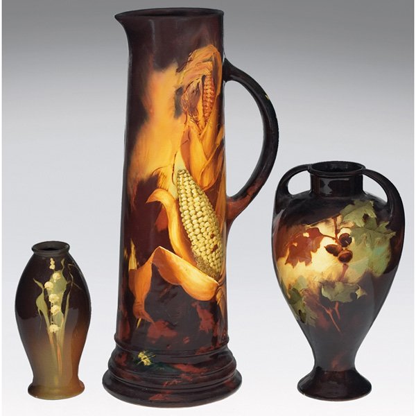 Lonhuda vase, lily of valley: Lonhuda vase, lily of valley design, 3.5"w x 7"h, restoration; with Weller Aurelian handled vessel, corn design, signed H. Mitchell, 6.5"w x 17"h, restoration; with a Weller Aurelian vase, double hand