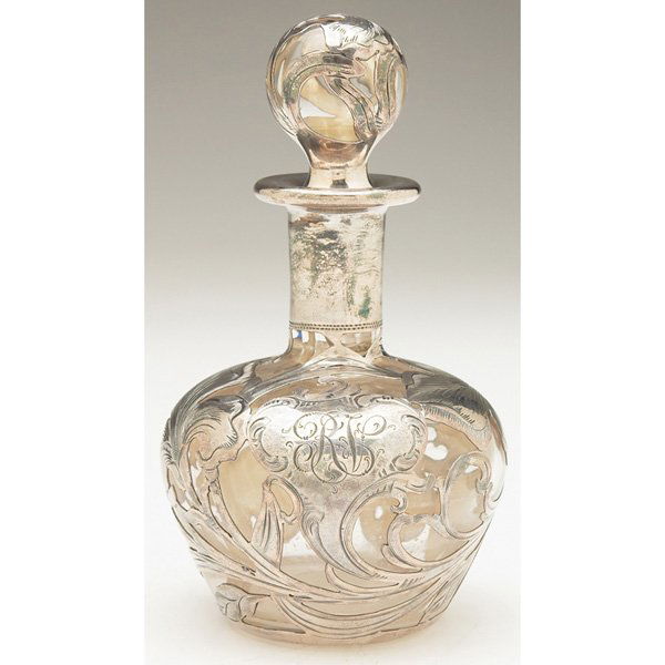 Steuben perfume: Steuben perfume, clear glass form with a round stopper, applied silver overlay with iris designs, monogrammed initials RV, unsigned, #623, silver marked Alvin and Black, Starr & Frost, #3091, 3"w x 5"