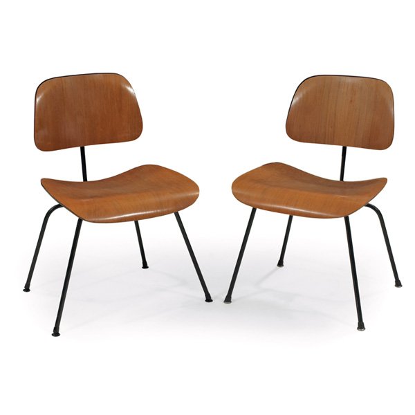 Charles & Ray Eames DCM dining chairs, pair, ash: Charles & Ray Eames DCM dining chairs, pair, by Herman Miller, 1950s, molded ash plywood seats and backs on black metal frame, all original shock mounts, original finish, one with replaced glides, one