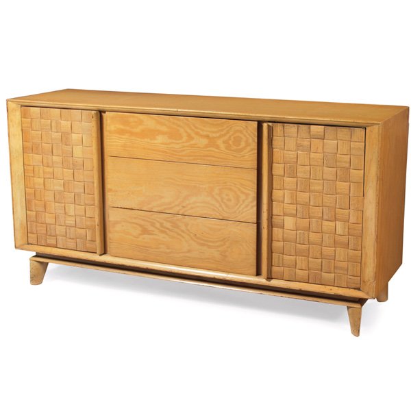 Paul Laszlo sideboard cabinet: Paul Laszlo sideboard cabinet, by Brown-Saltman, California, USA, oak, three center drawers flanked by doors, the doors feature Laszlo's signature covering of carved wood patchwork squares, top drawer