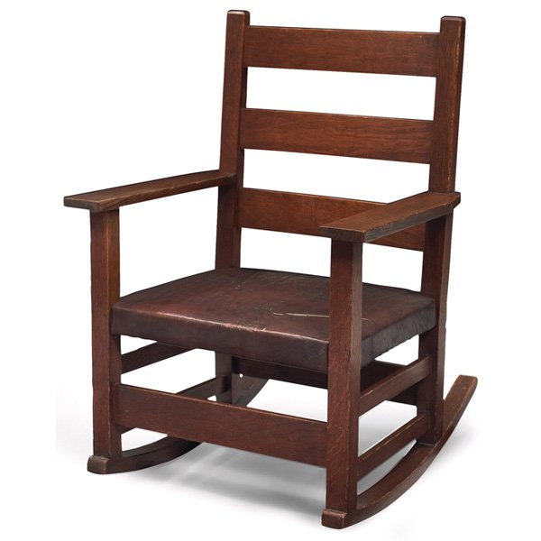 Gustav Stickley child's rocker: Gustav Stickley child's rocker, #343, three horizontal slats at back above a good original hard leather seat, Field's retailer's label, signed with red decal, original finish, 18"w x 20"d x 25"h, very