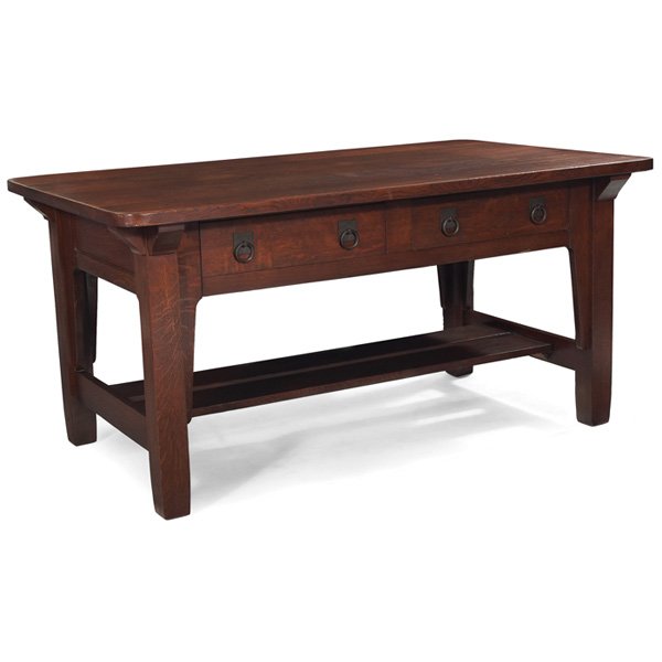 Stickley Brothers library table: Stickley Brothers library table, #2502, large rectangular top with rounded corners above corbel supports and two drawers with original copper pulls, tapered legs and a double lower stretcher, recoated